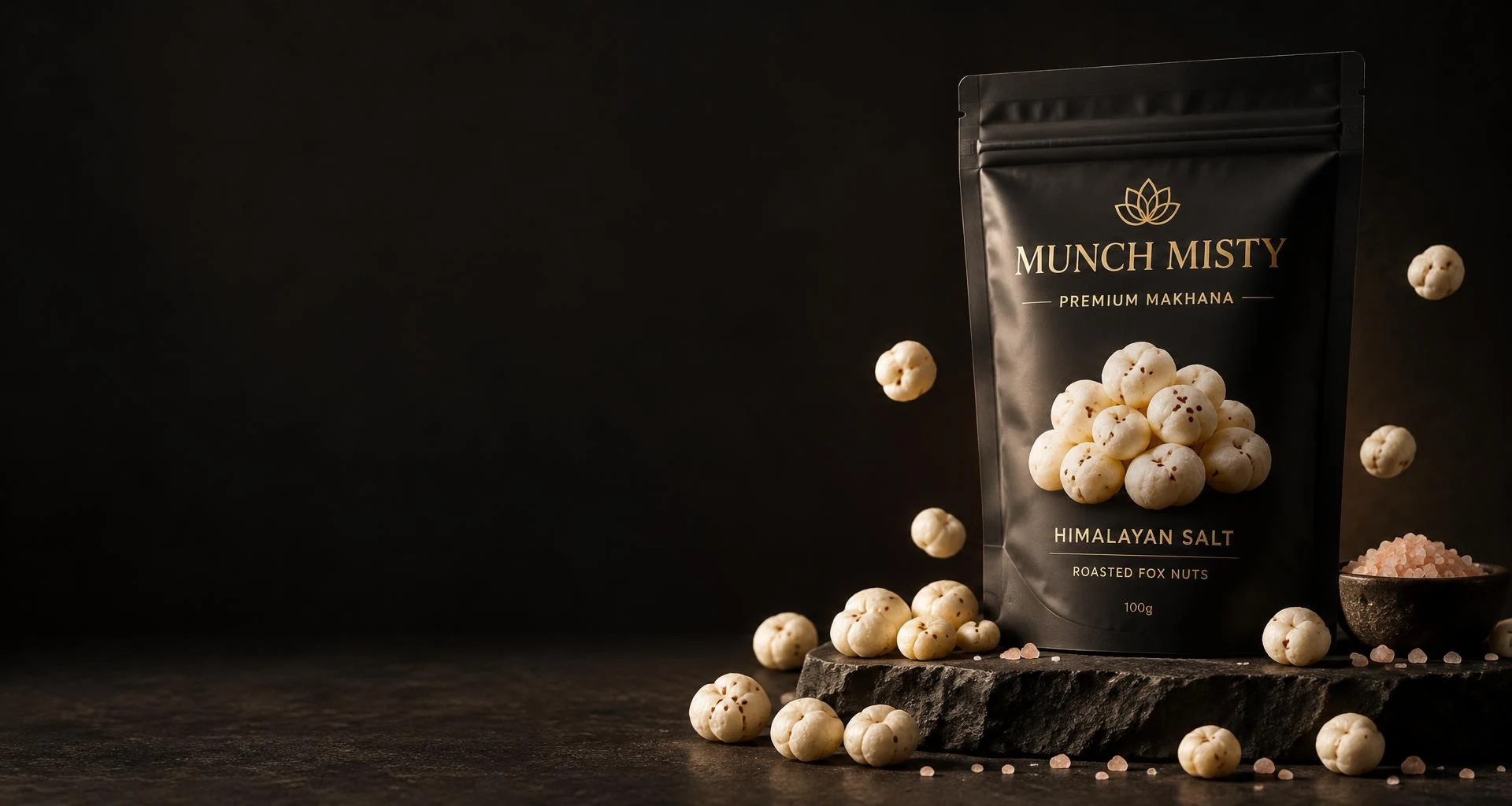 Munch Misty Himalayan Salt makhana on dark stone, with delicate fox nuts
